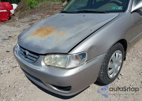 2001 Toyota Corolla Le from USA, damaged, VIN 2T1BR12E41C397393